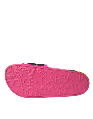 Pink and black Dolce & Gabbana logo beachwear flat sandals with open toe design and slip-on style.