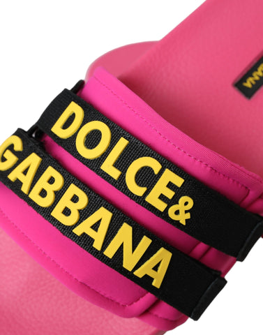 Pink and black Dolce & Gabbana logo beachwear flats sandals with open toes and stylish design, perfect for summer outings.