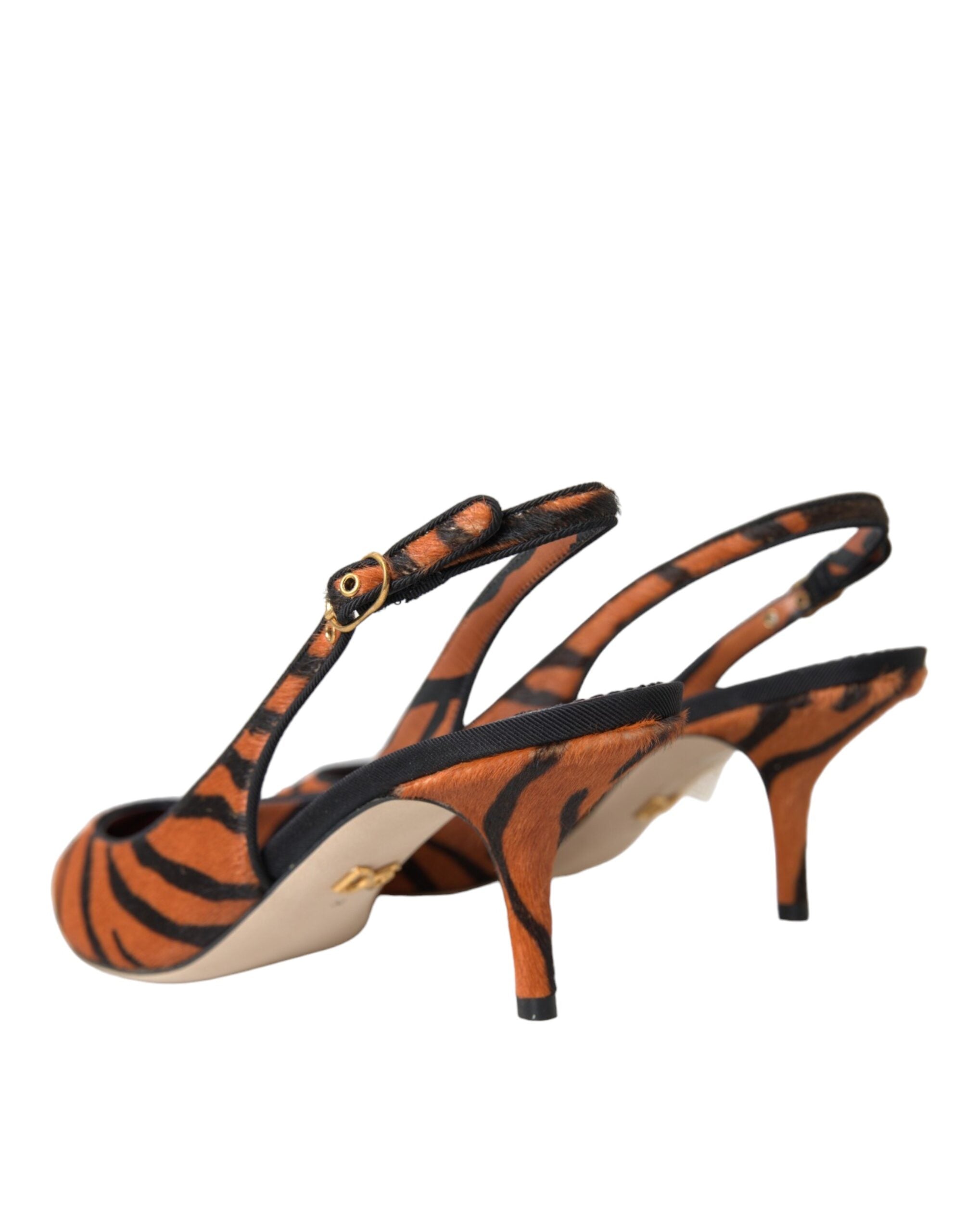 Dolce & Gabbana black and orange zebra leather slingback shoes with pointed toes and ankle straps.