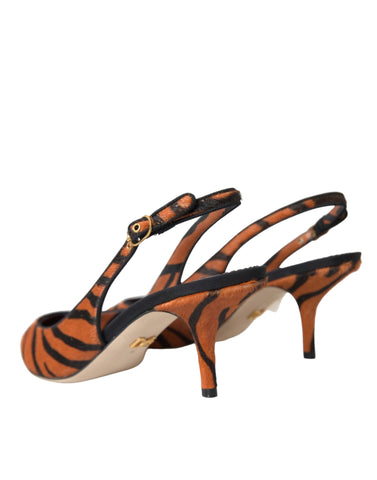 Dolce & Gabbana black and orange zebra leather slingback shoes with pointed toes and ankle straps.