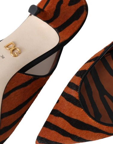 Dolce & Gabbana black and orange zebra leather slingback shoes with pointed toes and ankle straps.