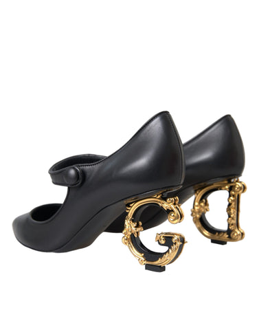 Black leather Mary Jane pumps with logo detailing from Dolce & Gabbana, featuring a classic heel and rounded toe.