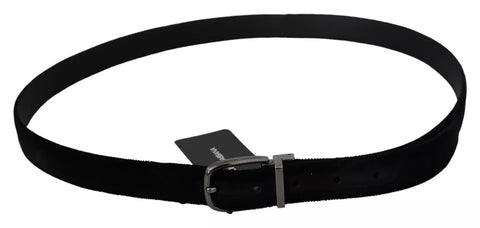Black velvet men's belt with silver-tone metal buckle by Dolce & Gabbana, featuring a sleek and sophisticated design.