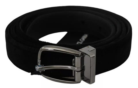 Black velvet men's belt with silver tone metal buckle by Dolce & Gabbana, featuring a smooth velvet strap and polished buckle detail.