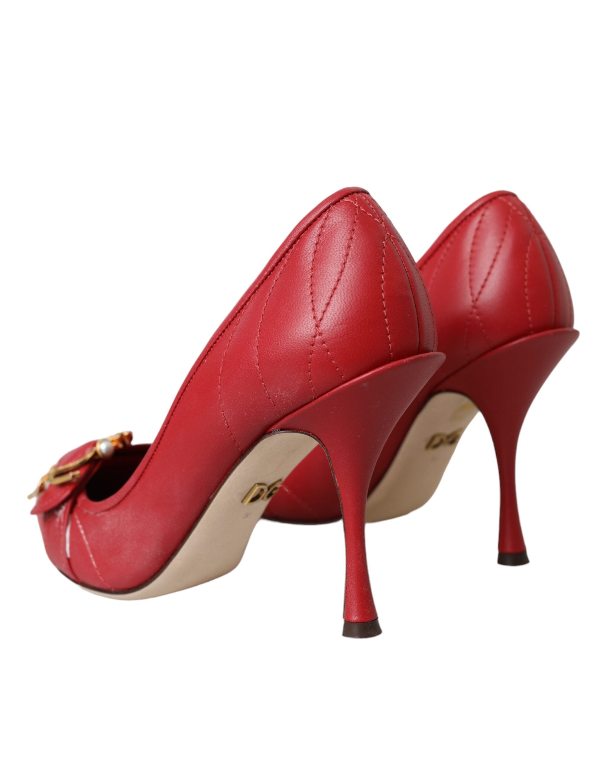 Red Devotion leather heels by Dolce & Gabbana, stylish pump shoes with sleek design and pointed toes.