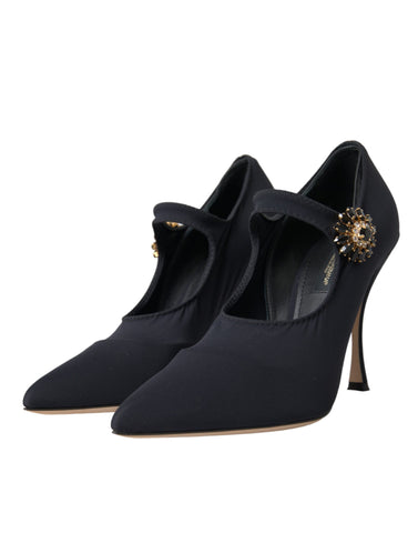Black Mary Jane crystal pumps shoes by Dolce & Gabbana with a sleek design and decorative crystal accents.