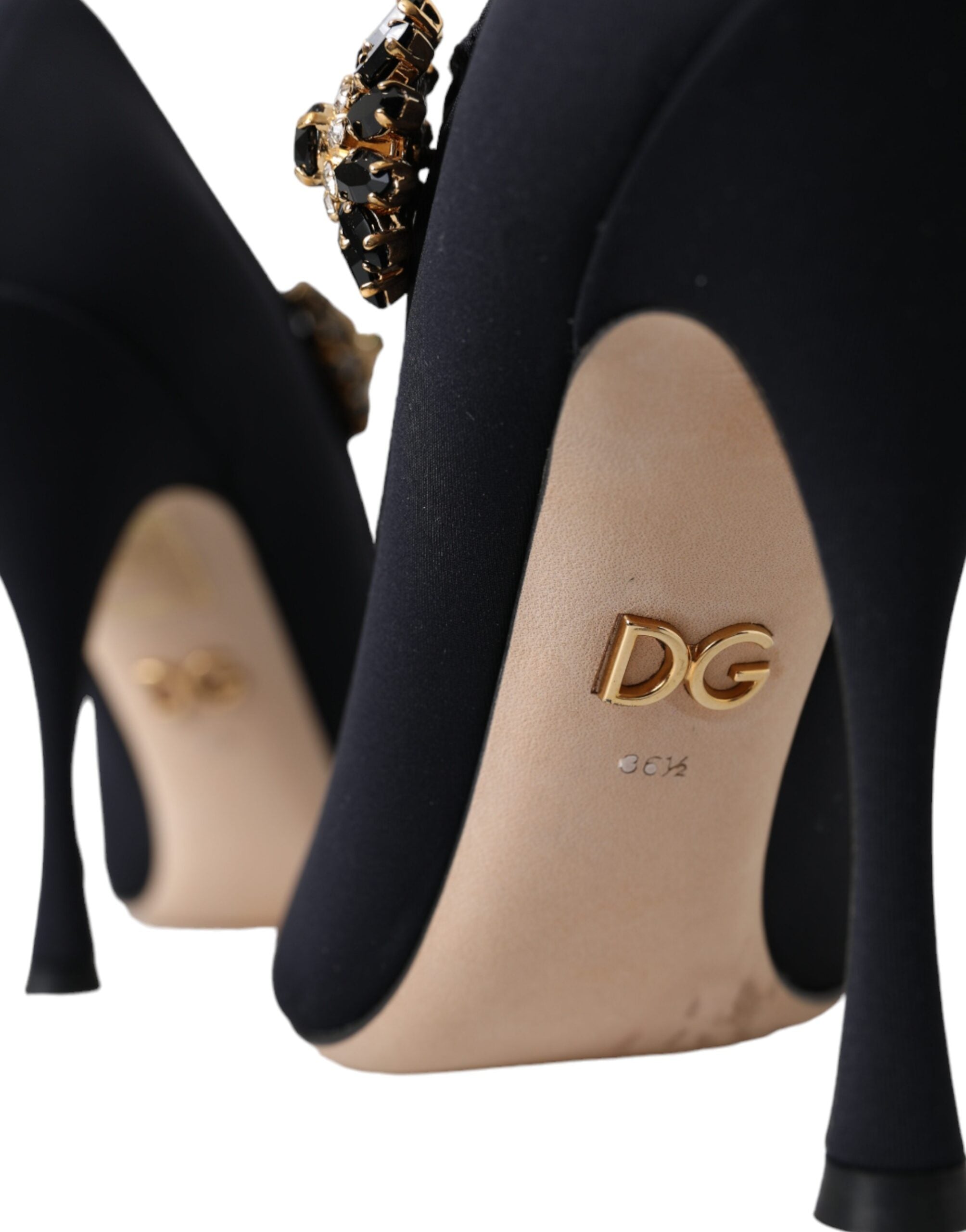 Black Mary Jane jersey crystal pumps shoes by Dolce & Gabbana with crystal embellishments and classic strap design.