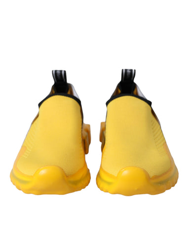 Yellow Sorrento slip-on sneakers for women by Dolce & Gabbana, featuring a stylish design and comfortable fit.