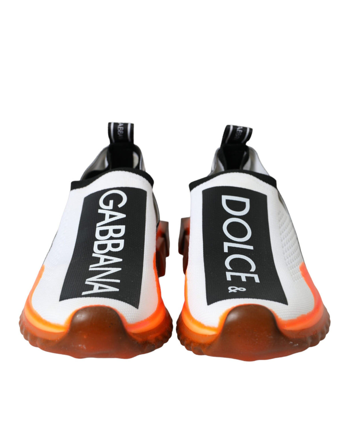 Dolce & Gabbana black, white, and orange slip-on Sorrento sneakers on a white background.