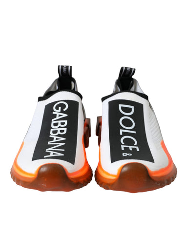 Dolce & Gabbana black, white, and orange slip-on Sorrento sneakers on a white background.