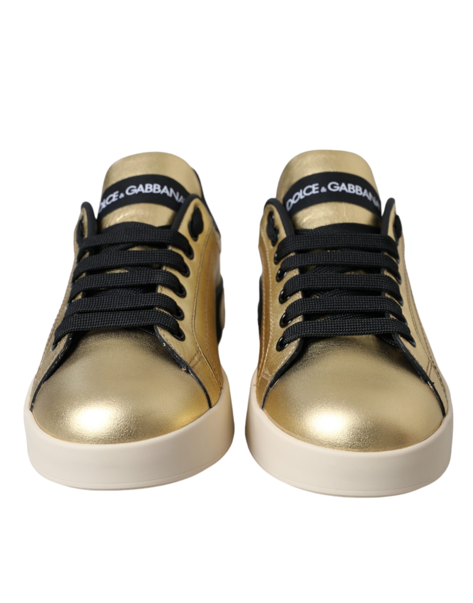 Dolce & Gabbana Gold Portofino calf leather sneakers for women, stylish casual shoes with sleek design and gold finish.