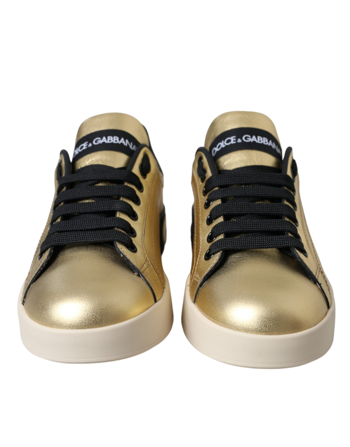 Dolce & Gabbana Gold Portofino calf leather sneakers for women, stylish casual shoes with sleek design and gold finish.