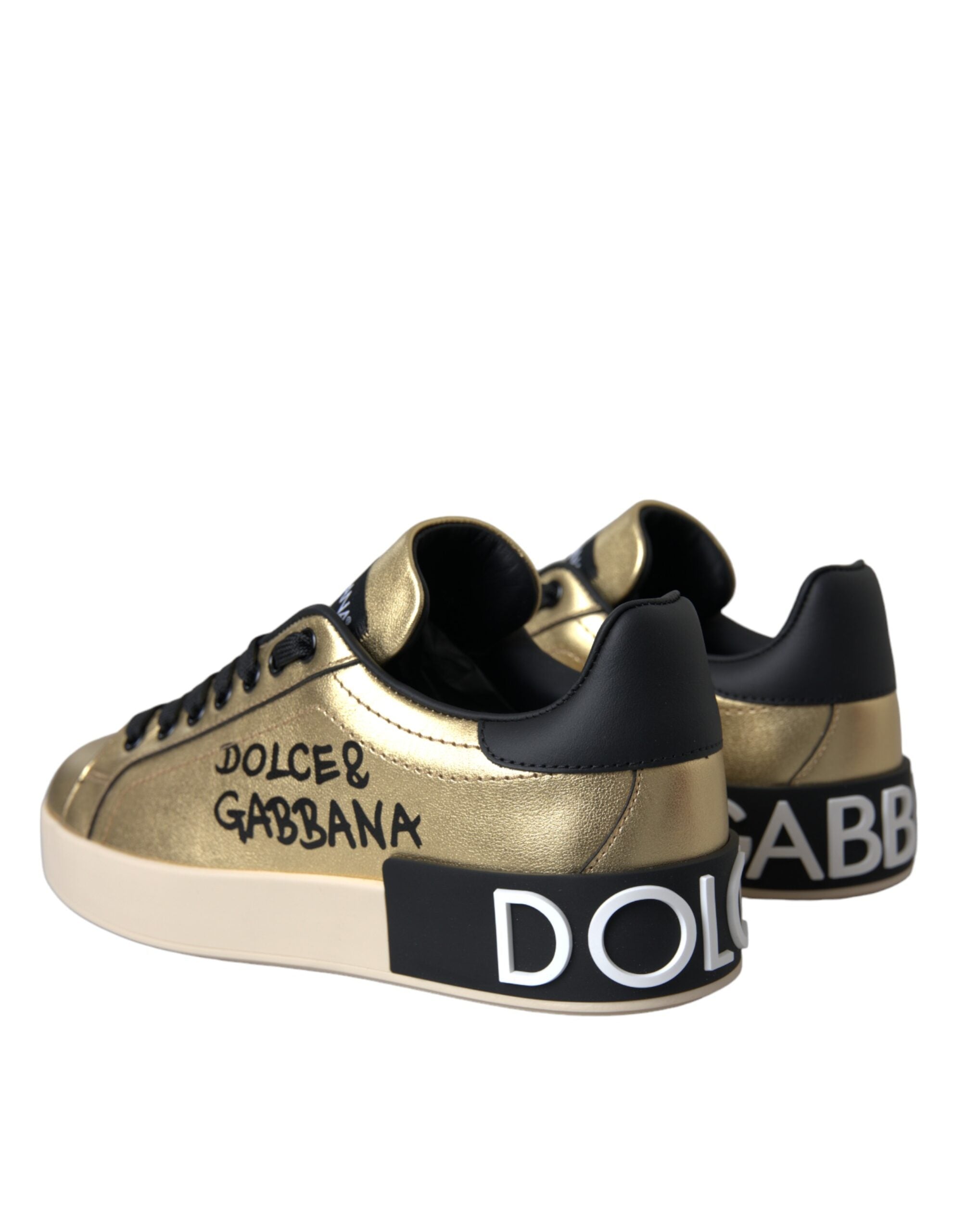 Gold Portofino calf leather sneakers for women by Dolce & Gabbana, showcasing stylish gold sneakers with sleek design and branding.