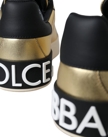 Gold Portofino calf leather sneakers for women by Dolce & Gabbana, featuring sleek design and stylish gold accents.