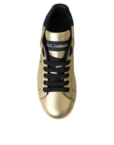 Gold Portofino calf leather sneakers for women by Dolce & Gabbana, featuring stylish design and comfortable fit.