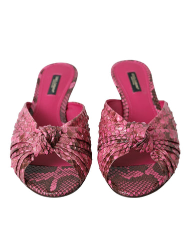 Pink exotic leather kitten heel slides shoes by Dolce & Gabbana with a sleek, stylish design and open-toe silhouette.