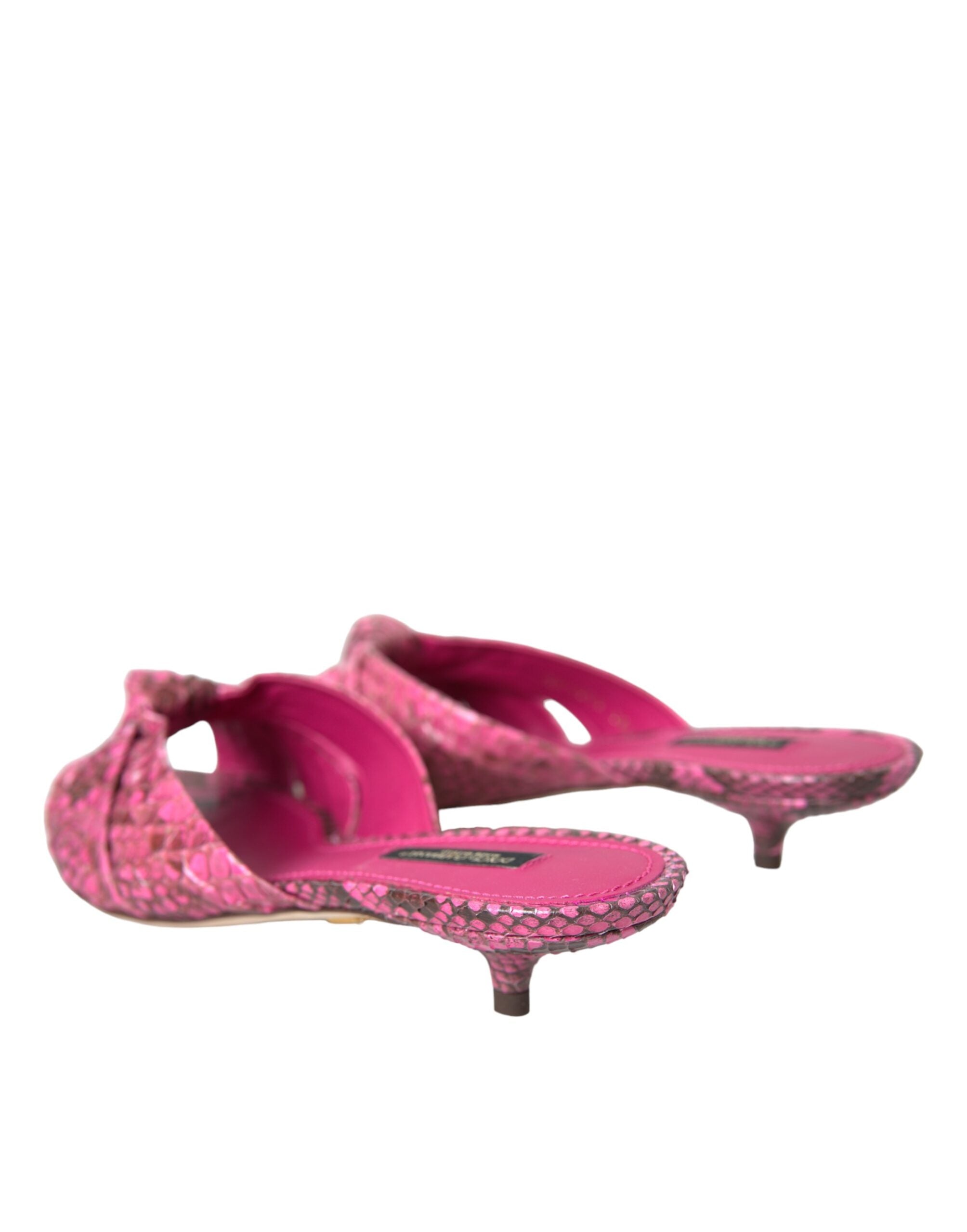 Pink exotic leather kitten heel slides shoes by Dolce & Gabbana with open toe and slip-on design.