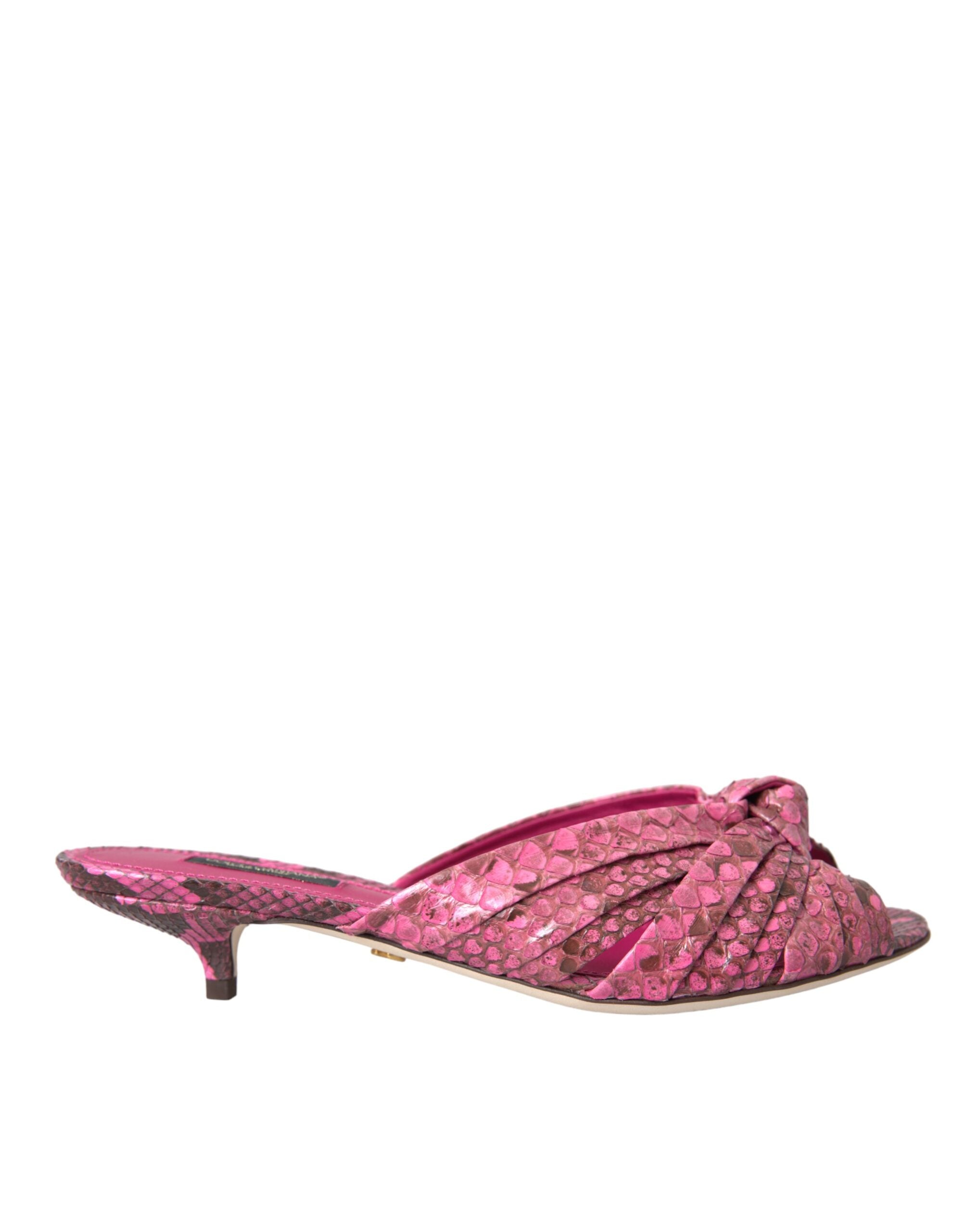Pink exotic leather kitten heel slides shoes by Dolce & Gabbana with open toe and slip-on design.