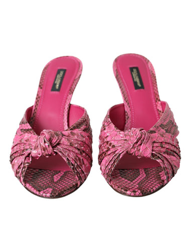 Pink exotic leather kitten heels slides by Dolce & Gabbana, showcasing sleek design and elegant slip-on style.