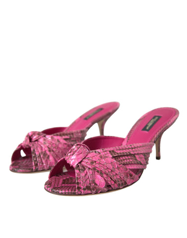 Pink exotic leather kitten heel slides shoes by Dolce & Gabbana with a sleek design and open-toe style.