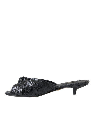 Black exotic leather Dolce & Gabbana slides shoes with open-toe design and slip-on style.