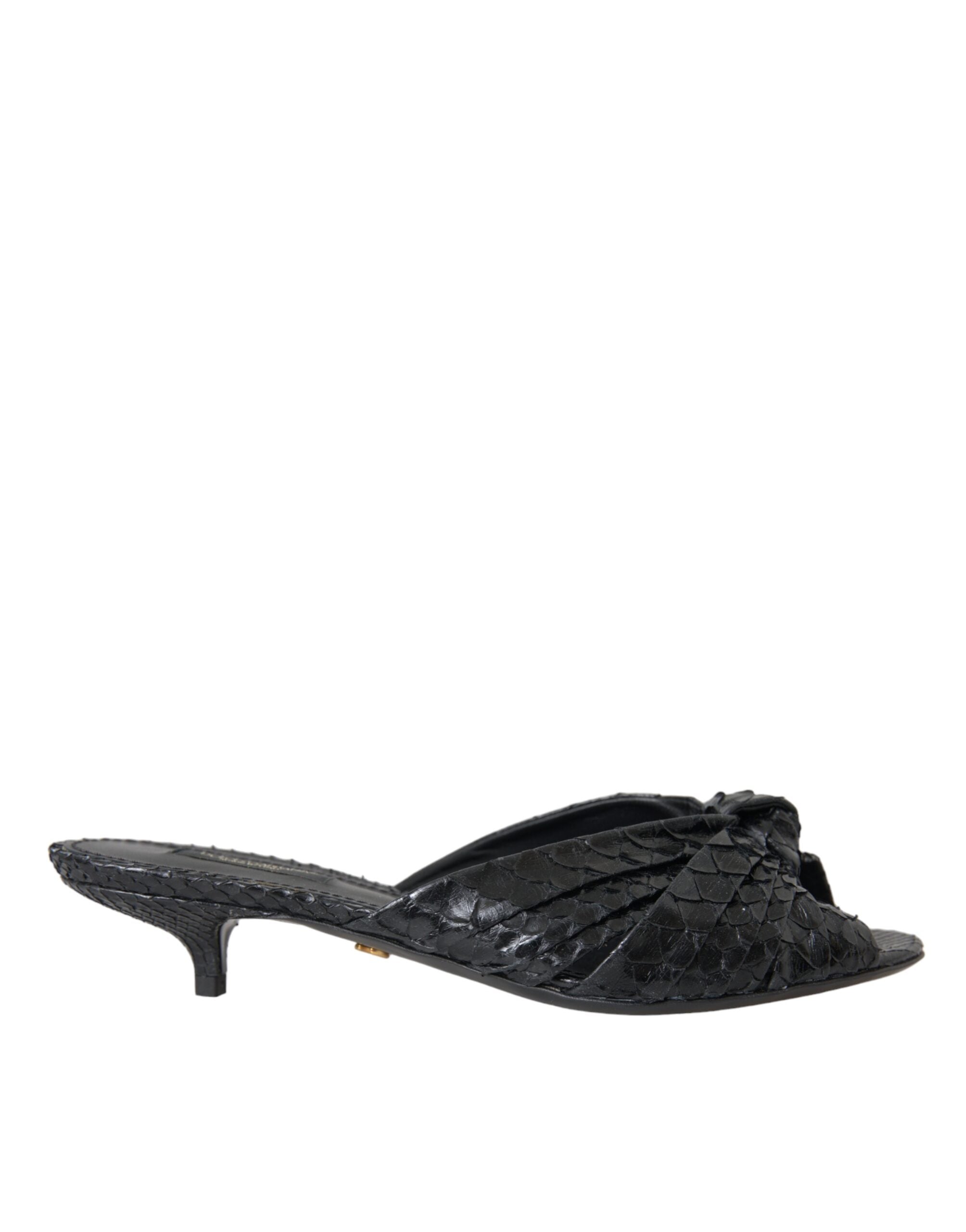 Black exotic leather slides shoes from Dolce & Gabbana featuring sleek, stylish heels and open-toe design.