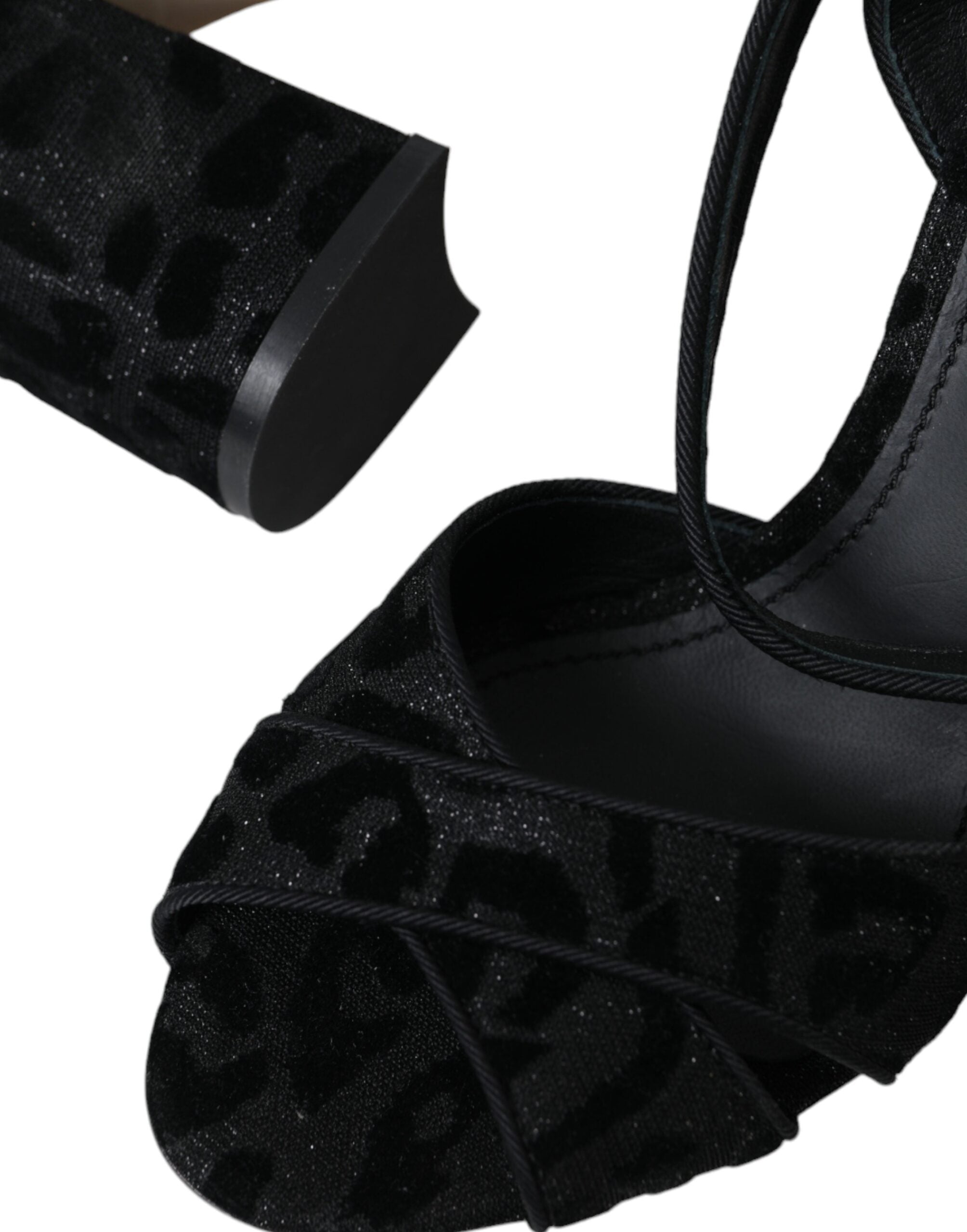 Dolce & Gabbana black leopard suede heels sandals with open toes and ankle straps, stylish and luxurious footwear.
