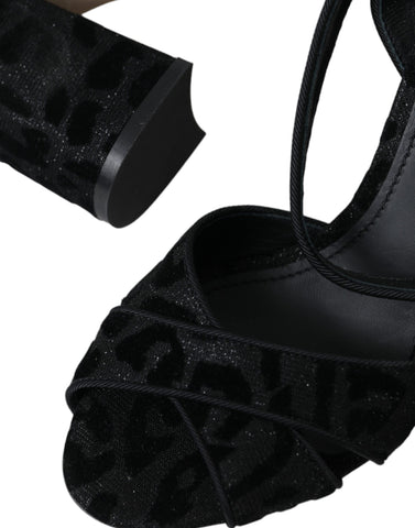 Dolce & Gabbana black leopard suede heels sandals with open toes and ankle straps, stylish and luxurious footwear.