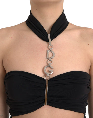 Black cut-out sleeveless bodycon mini dress by Dolce & Gabbana displayed on a hanger.