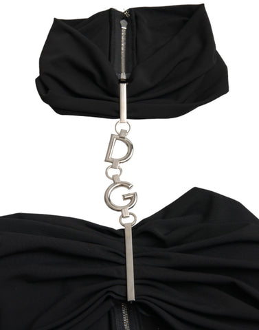 Black cut-out sleeveless bodycon mini dress by Dolce & Gabbana, shown with fitted silhouette and stylish design details.
