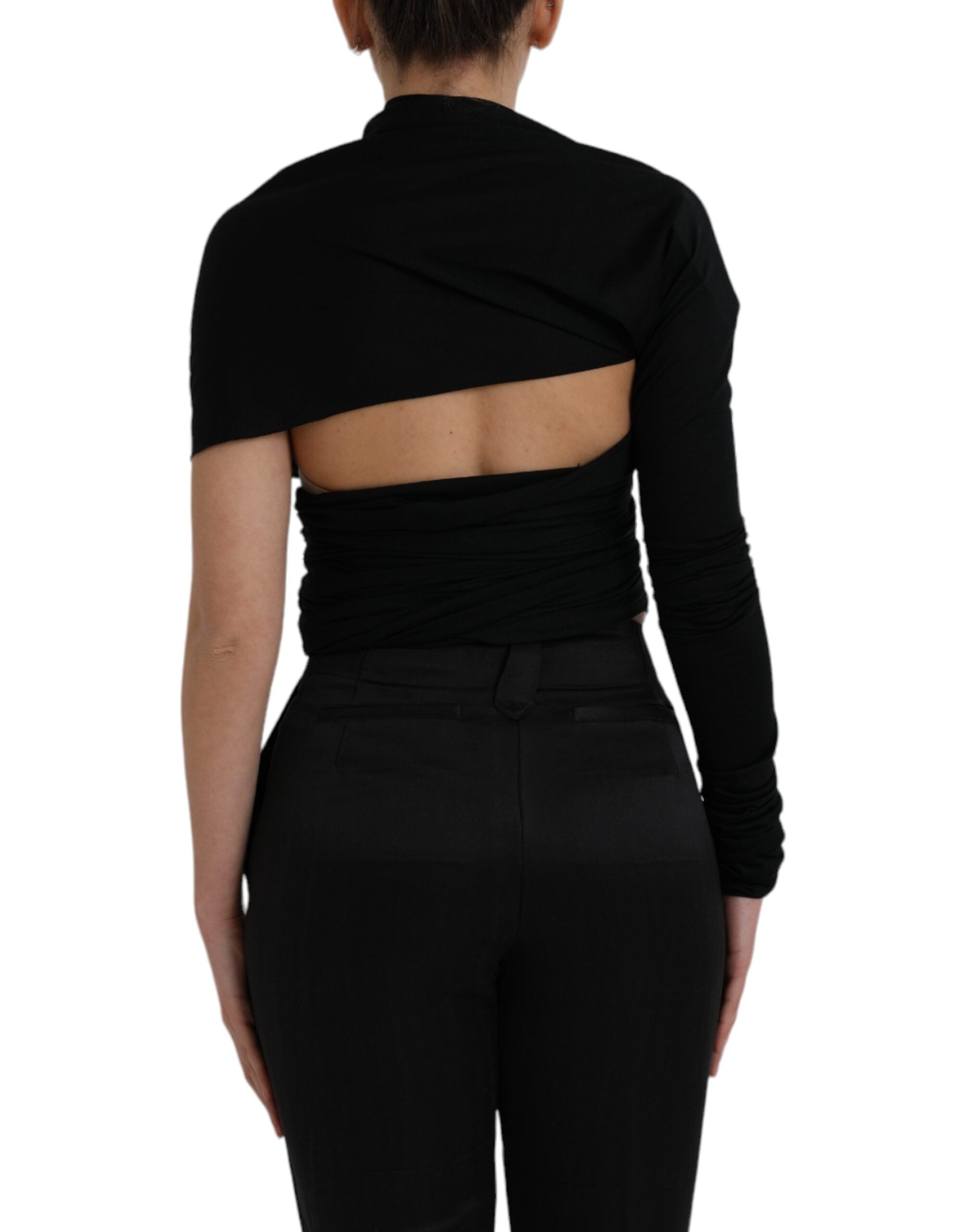 Black wool asymmetric long sleeve top with cutout details from Dolce & Gabbana, shown on a model.
