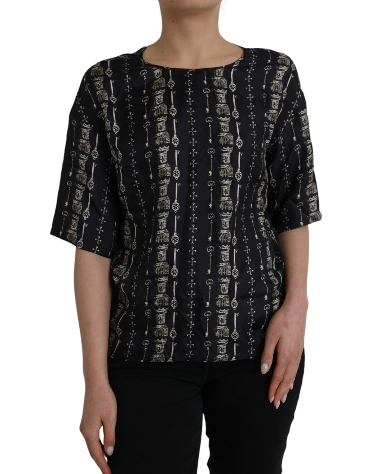 Black silk blouse with castle print and key design, Dolce & Gabbana T-shirt, stylish and elegant for sophisticated casual wear.