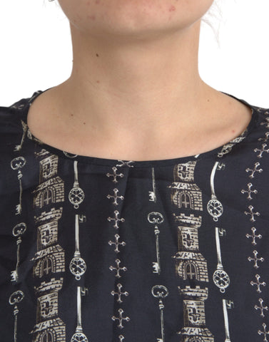 Black silk blouse with castle print by Dolce & Gabbana, featuring a relaxed fit and elegant design.