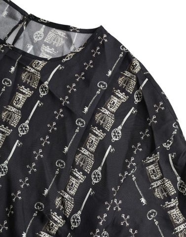 Black silk blouse with castle print, Dolce & Gabbana T-shirt featuring a stylish key design and elegant fabric.