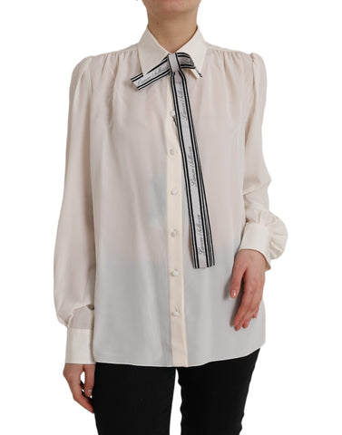Dolce & Gabbana Off White long sleeve button-down blouse top, stylish women's shirt with classic collar and elegant design.