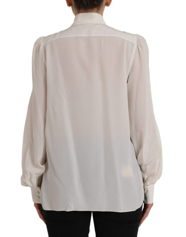 Dolce & Gabbana off-white long sleeve button-down blouse top, featuring classic collar and button front, elegant and stylish.
