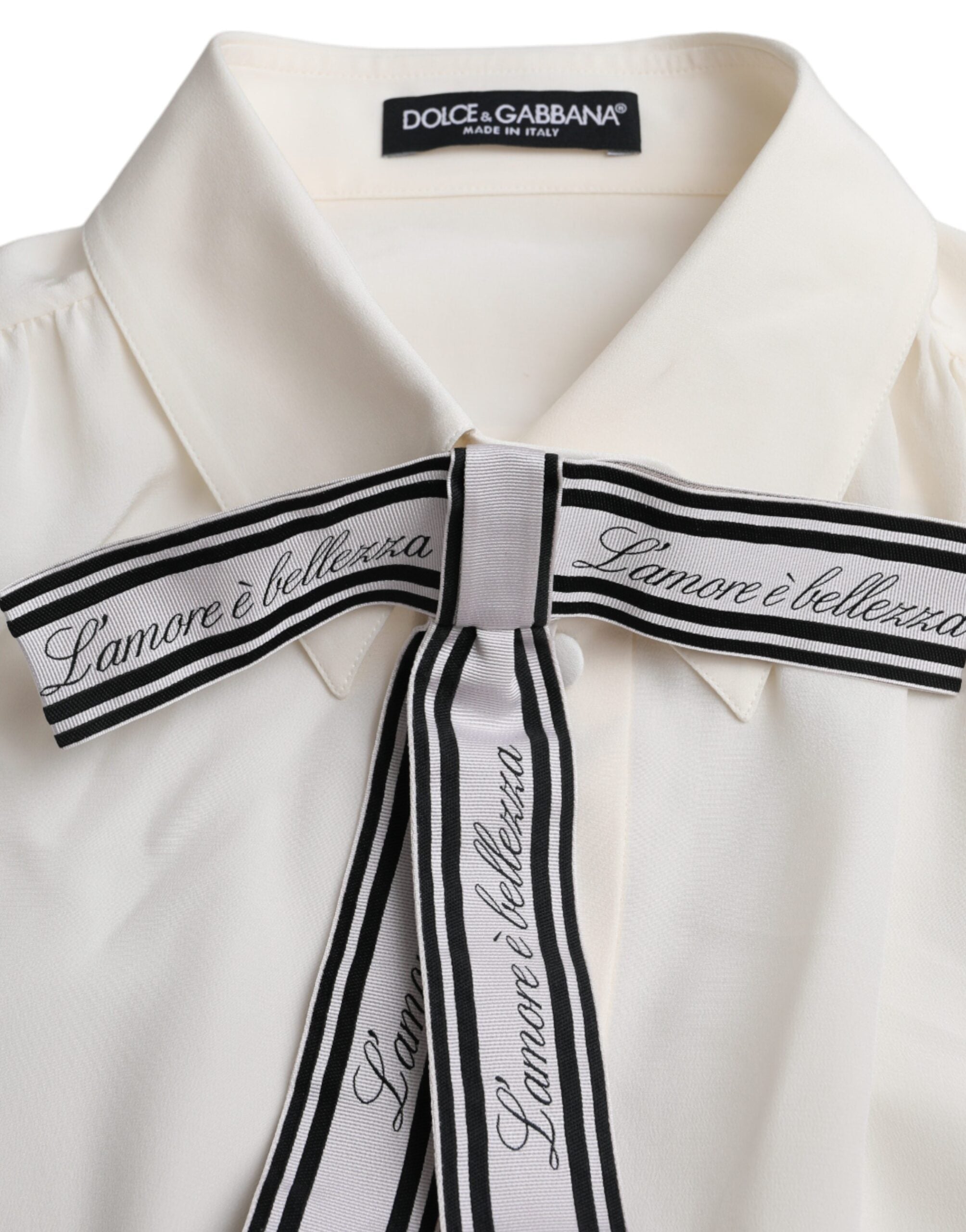 Dolce & Gabbana off white long sleeve button-down blouse top with classic collar and tailored fit.
