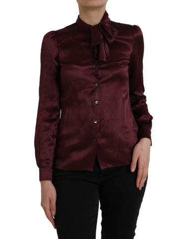 Maroon Dolce & Gabbana long sleeve blouse with ascot collar, stylish and elegant top with detailed design.