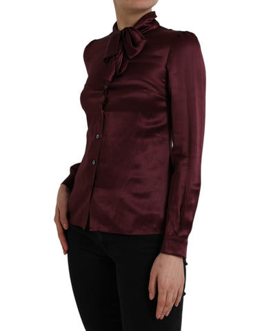 Maroon Dolce & Gabbana long sleeve blouse with ascot collar, featuring a stylish and elegant design.