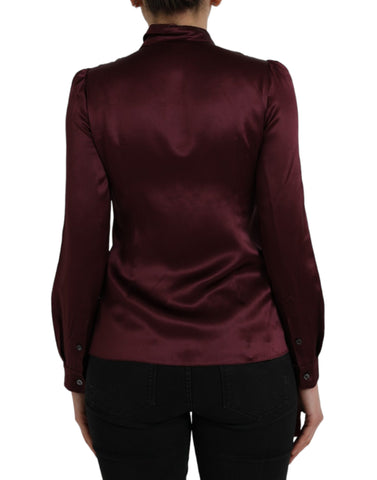Maroon Dolce & Gabbana long sleeve blouse with ascot collar, stylish and elegant top, perfect for sophisticated fashion looks.