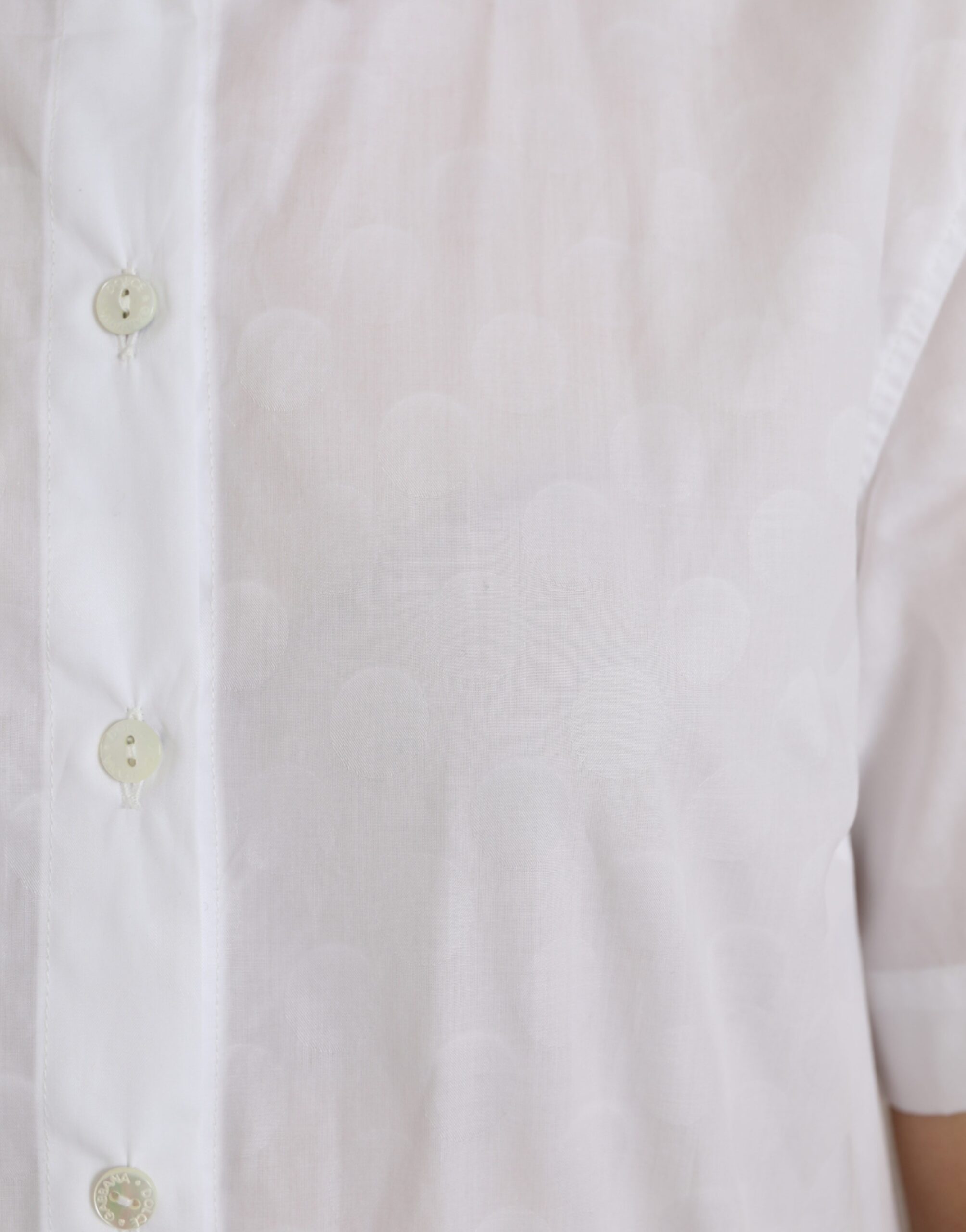 White collared short sleeve polo shirt top by Dolce & Gabbana, featuring a classic design and tailored fit.