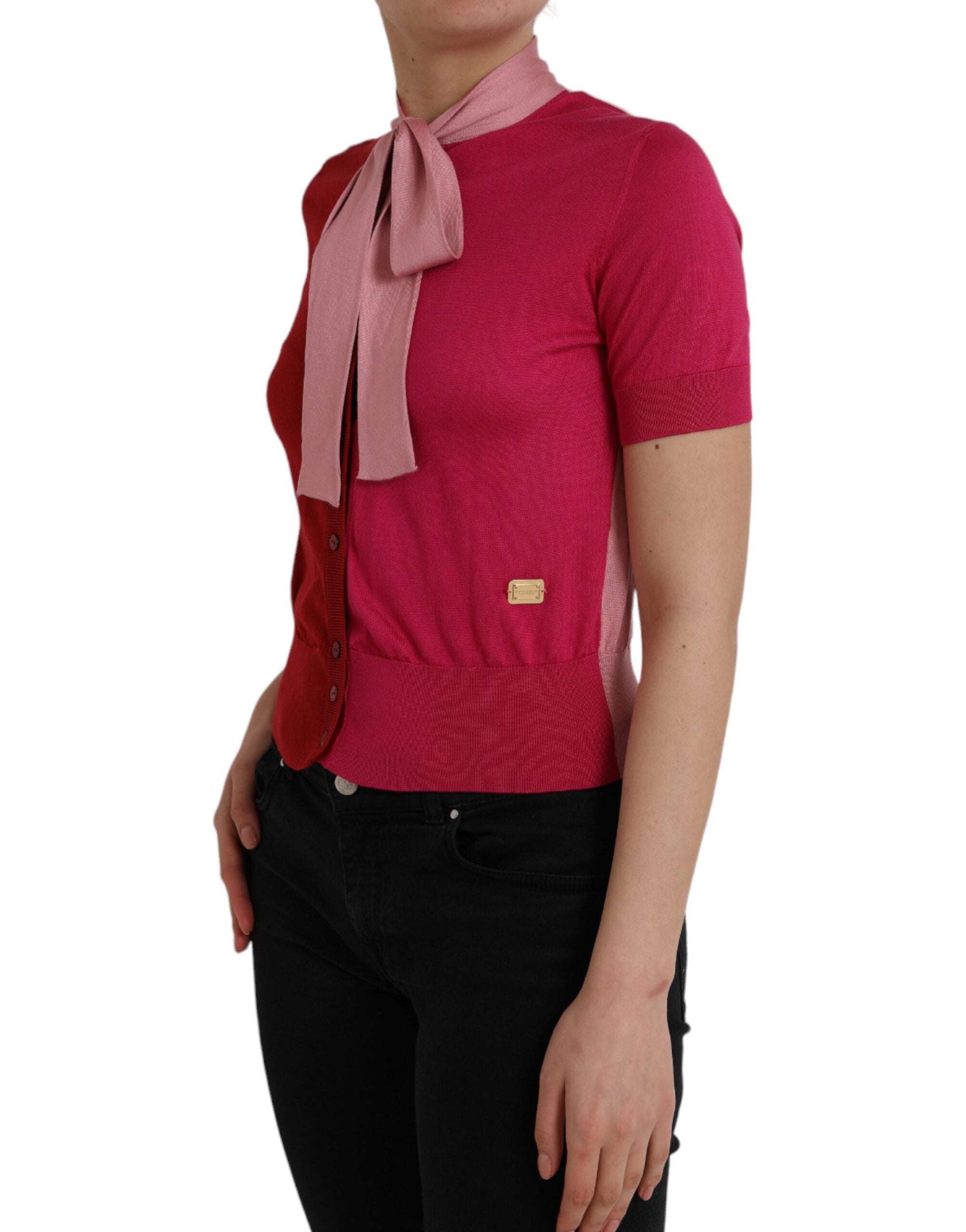 Pink short sleeve pullover with ascot collar by Dolce & Gabbana, featuring a stylish, lightweight knit fabric.