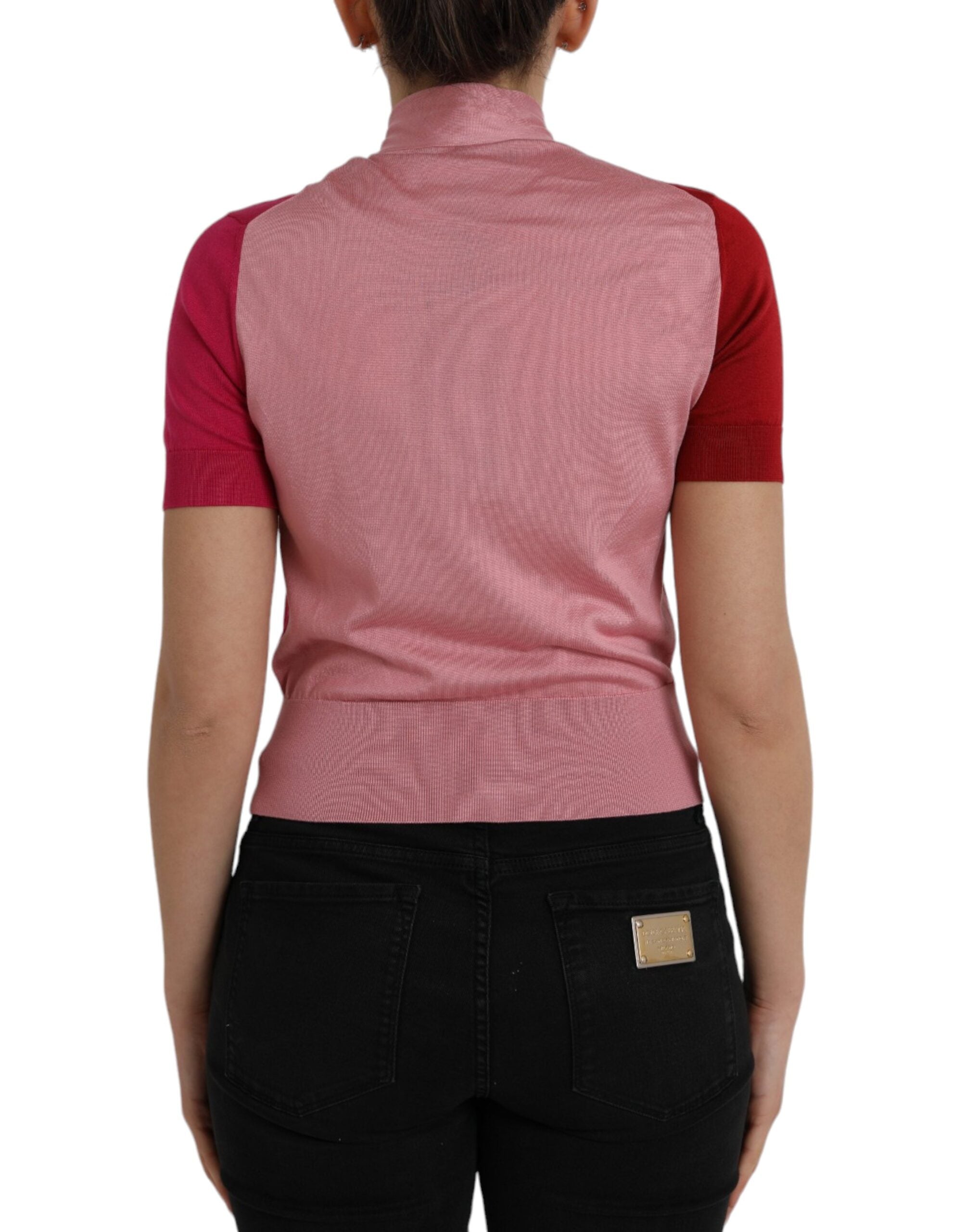 Pink short sleeve pullover top with ascot collar by Dolce & Gabbana, featuring a stylish, elegant design.