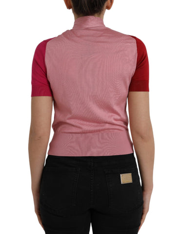 Pink short sleeve pullover top with ascot collar by Dolce & Gabbana, featuring a stylish, elegant design.
