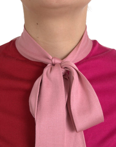 Pink Dolce & Gabbana short sleeve pullover top with ascot collar, casual and stylish women's fashion.
