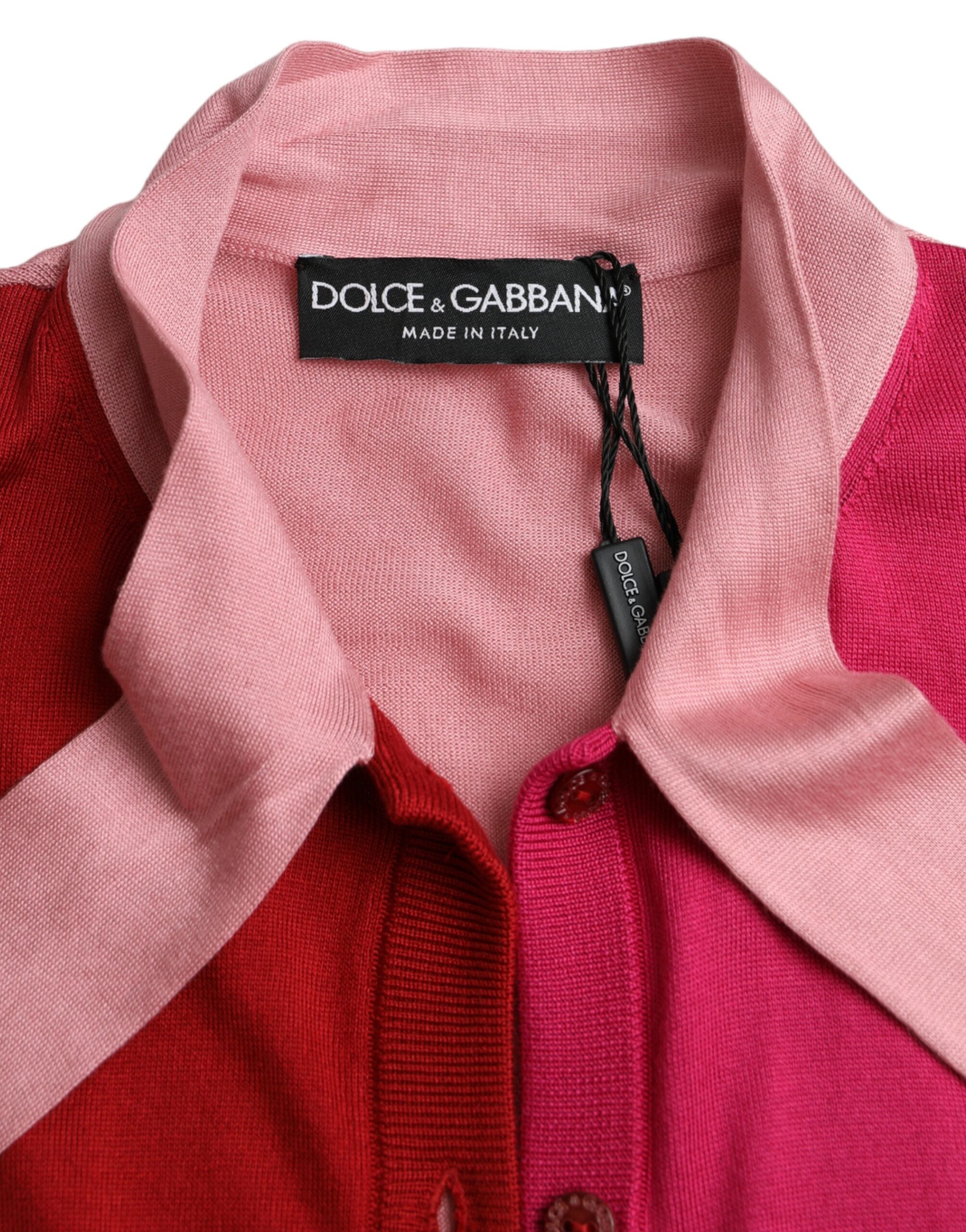 Pink Dolce & Gabbana short sleeve pullover top with ascot collar, stylish and lightweight for a chic look.
