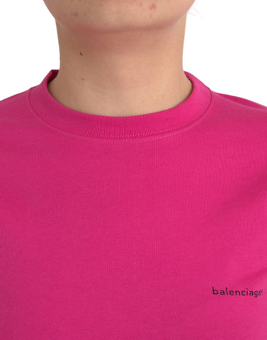 Pink Balenciaga cotton crew neck short sleeve T-shirt displayed flat, showing the simple, classic design and soft fabric.