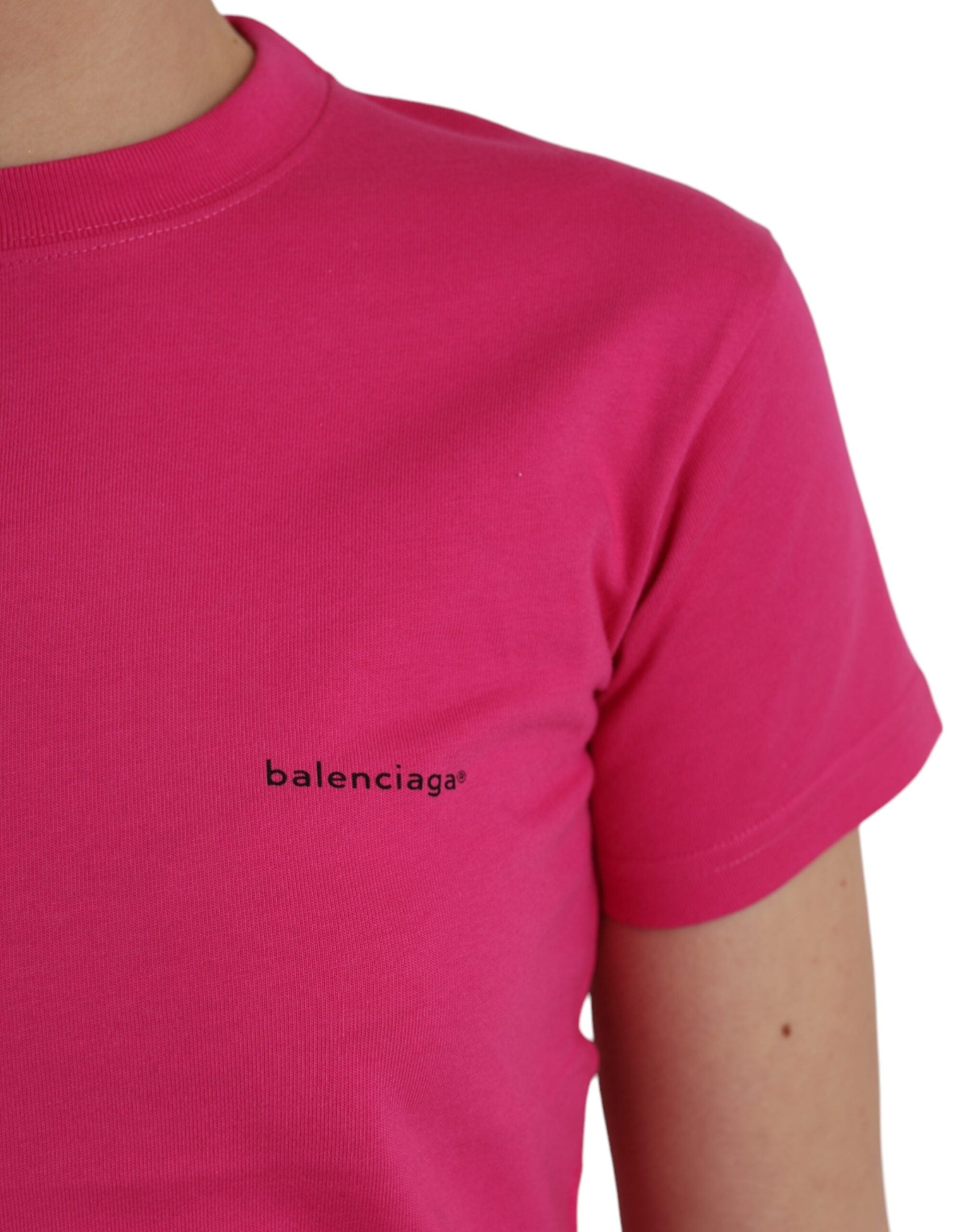 Pink cotton Balenciaga crew neck short sleeve T-shirt displayed flat with visible stitching and soft fabric texture.
