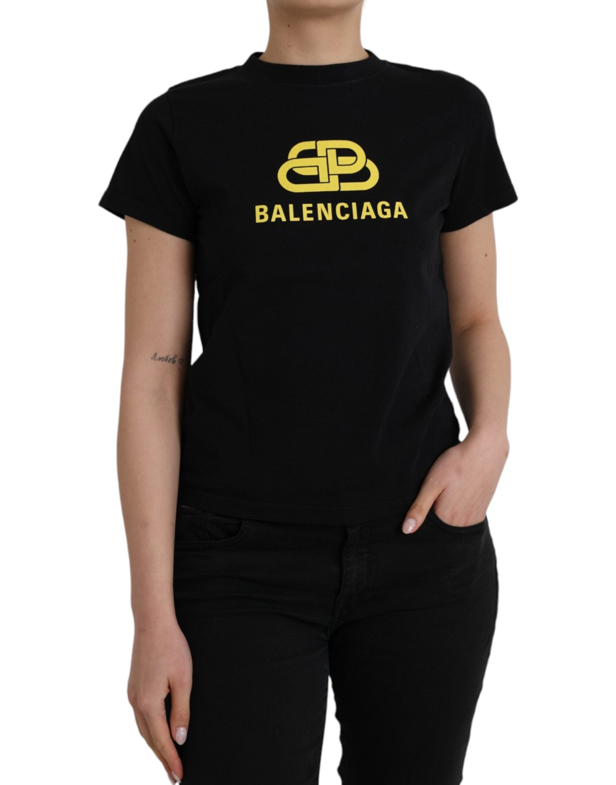 Black cotton crew neck T-shirt with Balenciaga logo print and short sleeves, casual and stylish men's clothing.