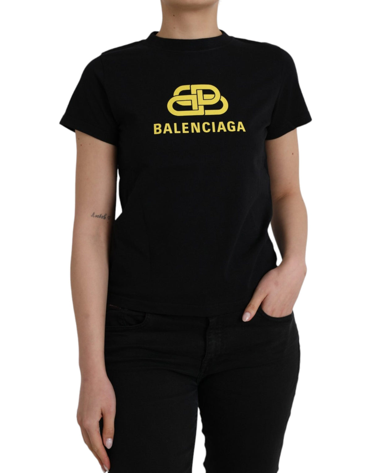 Black cotton crew neck T-shirt with Balenciaga logo print and short sleeves, casual and stylish men's clothing.